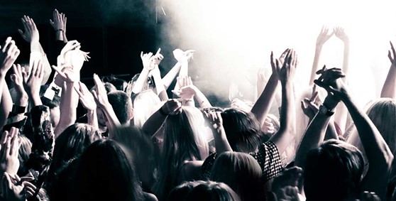 Entertainment Hero Image - People clapping at a concert